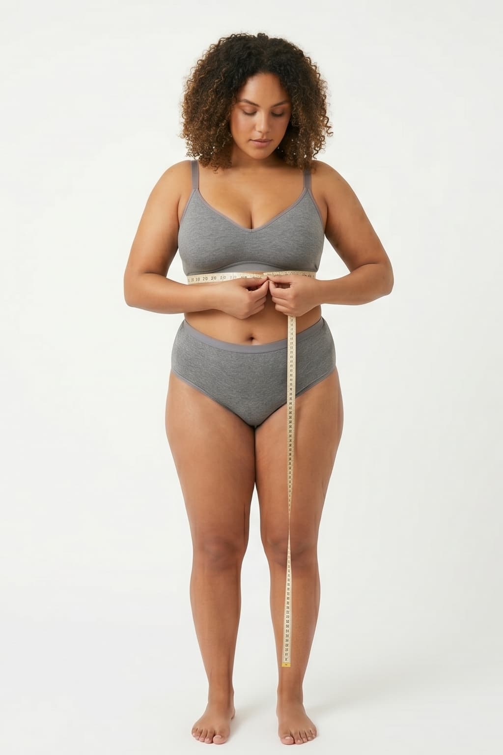 Woman measuring underbust for bra size